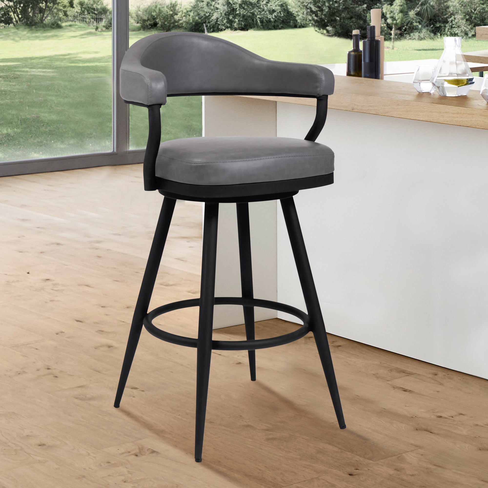 Justin  Counter or Bar Stool in a Black Powder Coated Finish and Vintage Grey Faux Leather